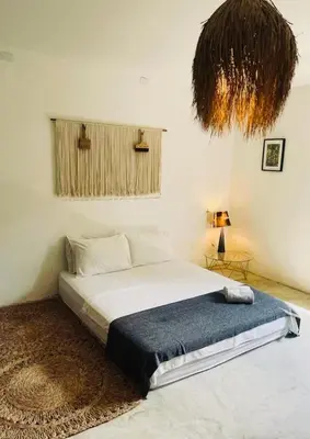 Uma cama ou camas num quarto em Cozy Place Jericoacoara