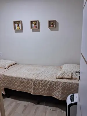 Uma cama ou camas num quarto em Casa Recanto Serra Verde