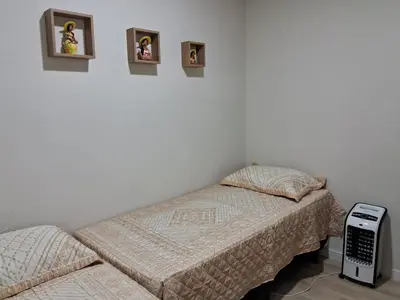 Uma cama ou camas num quarto em Casa Recanto Serra Verde