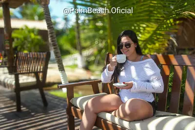 Os clientes hospedados em Pousada Palm Beach Praia de Caetanos Chalé Família