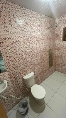 Uma casa de banho em Pousada Estilo Brasil