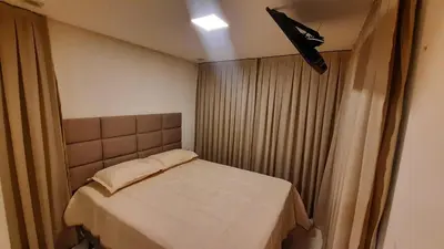 Uma cama ou camas num quarto em Mandara Lanai Beira da Praia