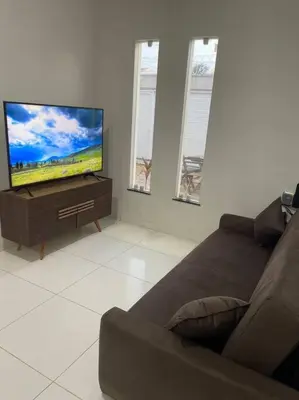 Uma televisão e/ou sistema de entretenimento em Casa Miguel Arcanjo