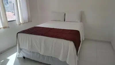 Uma cama ou camas num quarto em Lindo apto 6 hóspedes Meireles pertinho da Beira Mar