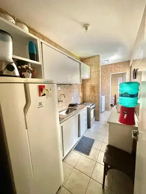 A cozinha ou kitchenette de Refúgio Familiar em Meireles - Natureza & Conforto