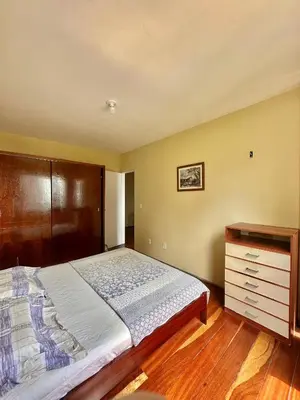 Uma cama ou camas num quarto em Refúgio Familiar em Meireles - Natureza & Conforto