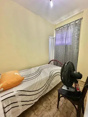 Uma cama ou camas num quarto em Refúgio Familiar em Meireles - Natureza & Conforto