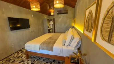 Uma cama ou camas num quarto em Carnaúba Hotel Boutique