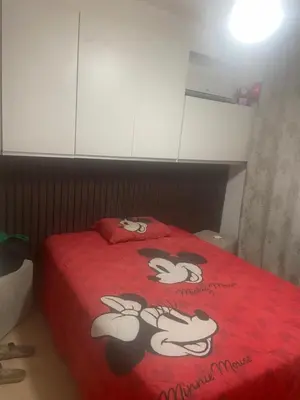 Uma cama ou camas num quarto em Carlos nascimento