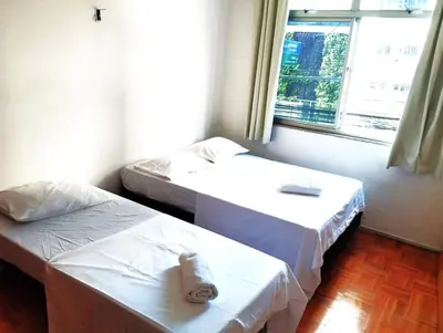 Uma cama ou camas num quarto em Meireles Beira Mar Gigante 3 Quartos