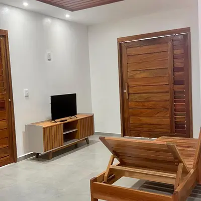Uma televisão e/ou sistema de entretenimento em Praia do Prea Casa 1