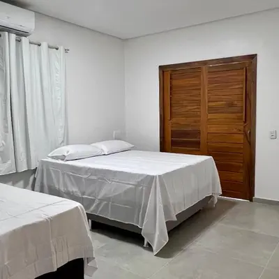 Uma cama ou camas num quarto em Praia do Prea Casa 1