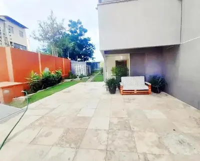 Um jardim no exterior de Fortaleza Praia iracema apartamento Guanaces vista mar