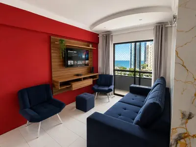 Uma televisão e/ou sistema de entretenimento em Fortaleza Praia iracema apartamento Guanaces vista mar