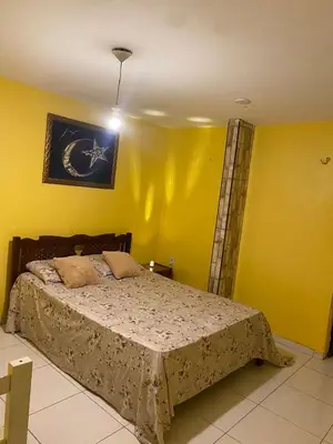 Uma cama ou camas num quarto em Portal do Sol