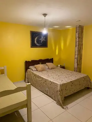 Uma cama ou camas num quarto em Portal do Sol