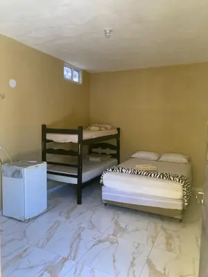 Uma cama ou camas num quarto em Portal do Sol