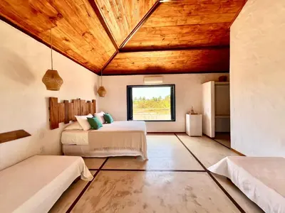 Uma cama ou camas num quarto em Pousada La vida boutique