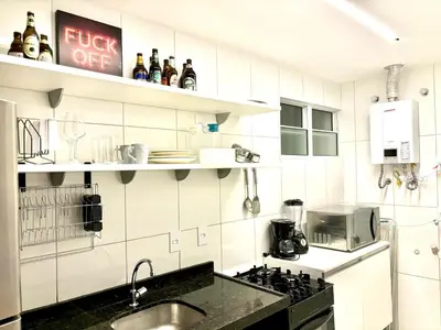 A cozinha ou kitchenette de Apartamento com piscina Praia de Iracema, Aquarius Residence-Fortaleza