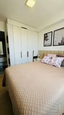 Uma cama ou camas num quarto em Apto com varanda e vista mar em condomínio Clube