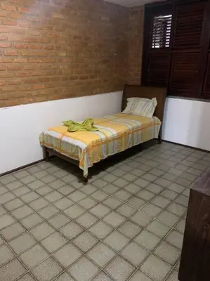 Uma cama ou camas num quarto em Mansão no Porto das Dunas, 5 min do Beach Park!