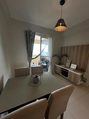 Uma área de estar em Cumbuco Residence