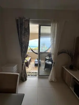 Uma área de estar em Cumbuco Residence