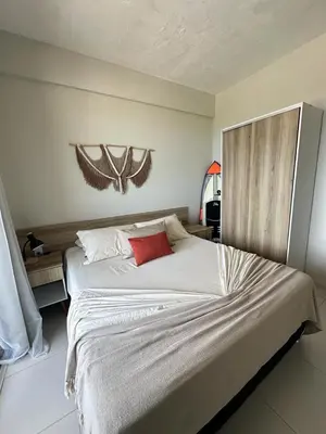 Uma cama ou camas num quarto em Cumbuco Residence