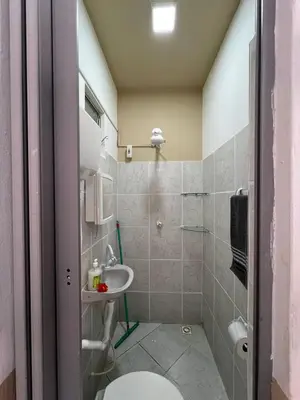 Uma casa de banho em Suíte Pé na Areia - Super Local