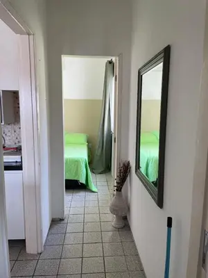 Uma cama ou camas num quarto em Flat 2 suítes no Porto das Dunas