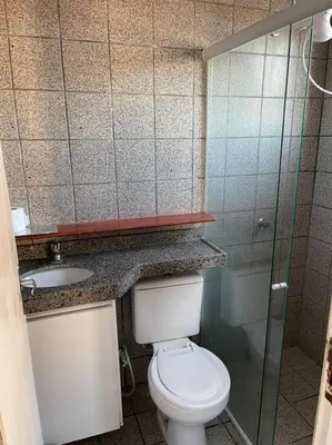 Uma casa de banho em Flat 2 suítes no Porto das Dunas
