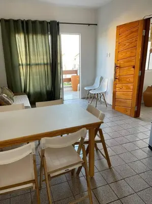 Uma área de estar em Flat 2 suítes no Porto das Dunas