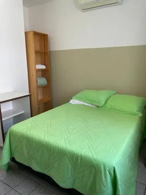 Uma cama ou camas num quarto em Flat 2 suítes no Porto das Dunas