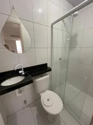 Uma casa de banho em Flat 2 suítes no Porto das Dunas