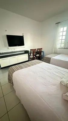 Uma cama ou camas num quarto em Casa Dunas