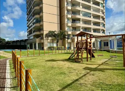A área de jogos para crianças em Condomínio Beach Village vista mar