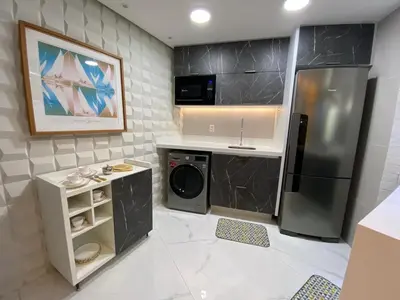 A cozinha ou kitchenette de Apartamento de luxo na Beira Mar