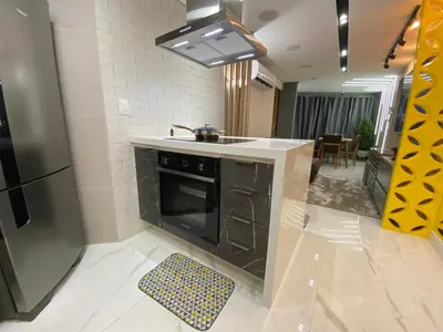 A cozinha ou kitchenette de Apartamento de luxo na Beira Mar