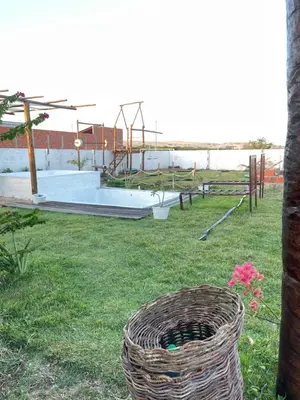 Um jardim no exterior de Pousada Casa Verde
