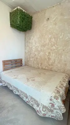 Uma cama ou camas num quarto em Pousada Casa Verde