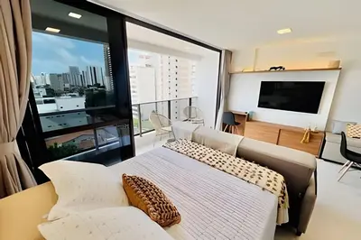 Uma cama ou camas num quarto em Flat Luxo com Coworking, Academia e Rooftop - WiFi 1Gb - Beira Mar 4 min