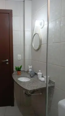 Uma casa de banho em Apartamento Sobre as Ondas