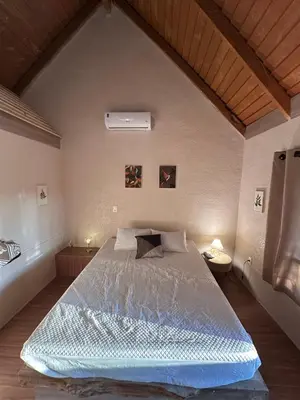 Uma cama ou camas num quarto em Chalé Suíco Nupcial III - Chalés Belo Monte