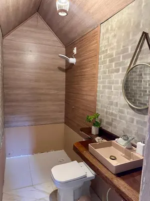 Uma casa de banho em Chalé Suíco Nupcial III - Chalés Belo Monte