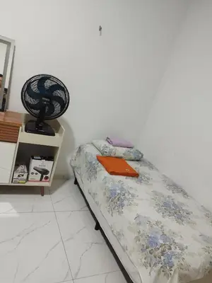 Uma cama ou camas num quarto em Casa Praia Paracuru - Orquídeas de Célia