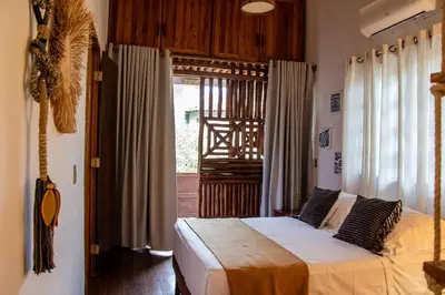 Uma cama ou camas num quarto em Vila Sofia