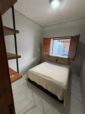 Uma cama ou camas num quarto em Refúgio a Beira Mar