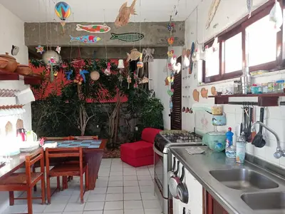 A cozinha ou kitchenette de Casa Jangada - Incrível vista mar com Piscina e a melhor localização na Beira Mar da Taíba