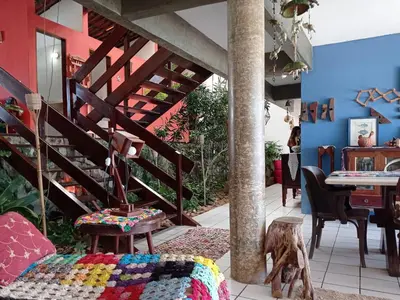 Uma área de estar em Casa Jangada - Incrível vista mar com Piscina e a melhor localização na Beira Mar da Taíba