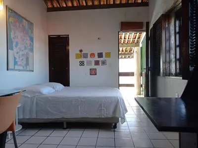 Uma cama ou camas num quarto em Casa Jangada - Incrível vista mar com Piscina e a melhor localização na Beira Mar da Taíba